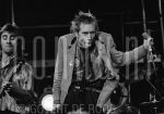 06-01-1977 Johnny Rotten with Sex Pistols live on stage at Paradiso Amsterdam

[keywords]Live, On Stage, Singer, Half Length, Black & White Image[/keywords]